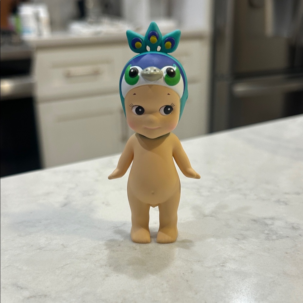 Authentic peacock sonny angel